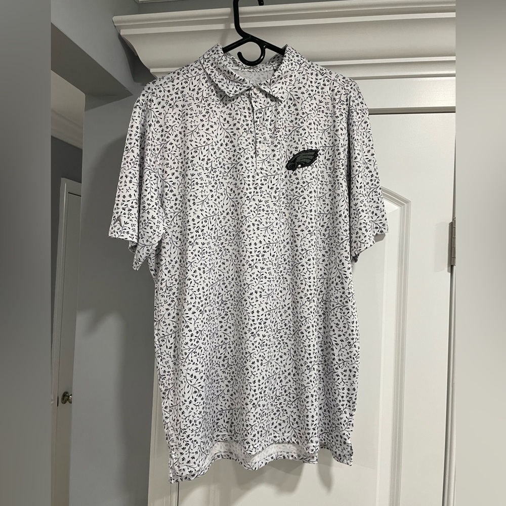 ANTIGUA PHILADELPHIA EAGLES MENS BLACK MOTION SHORT SLEEVE POLO